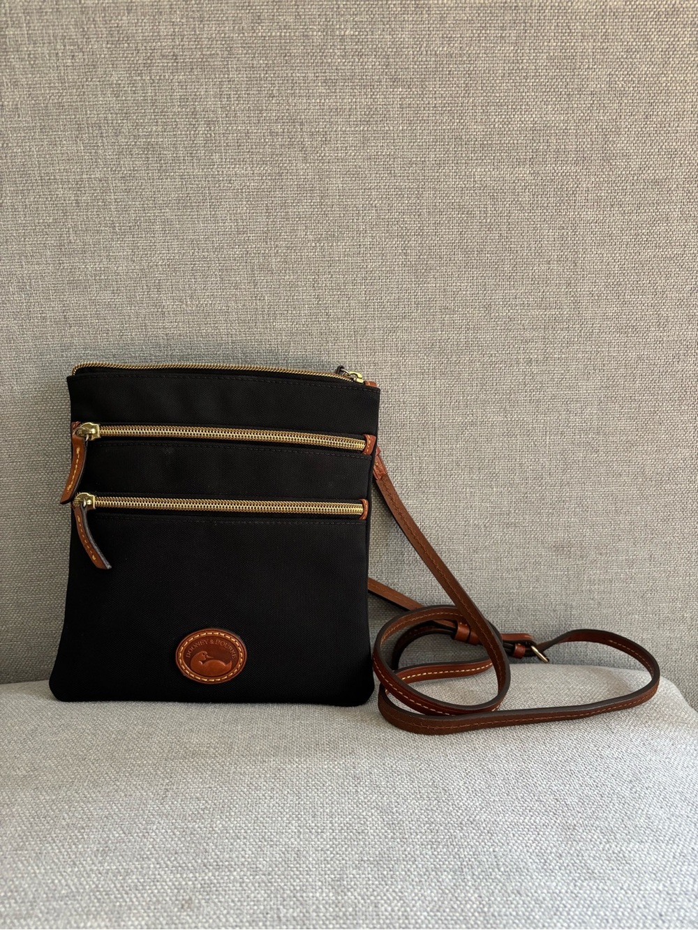 Dooney & Bourke Black Nylon Crossbody with Brown Trim and Gold Hardware